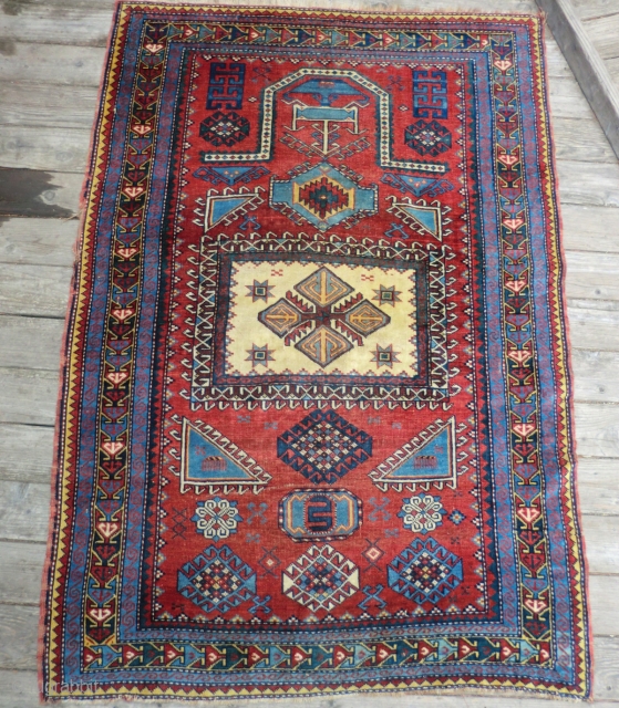 Antique Caucasian Karachov Kazak Rug -Approximately 52" by 77"
This is a turn of the century Caucasian Kazak rug from the Karachov region. It has great graphics and good colors. It features a  ...