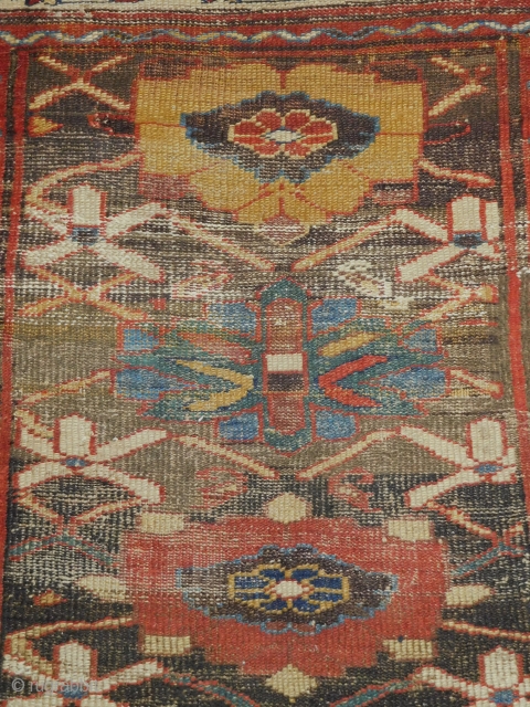 3.6x8 early kurdish rug 
it appears that it has a rewoven ends and sides                   