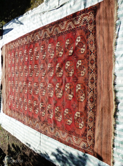 Turkmen Kizil Ayak Main Carpet. Sides ends original. Minor wear and staining in places - see pictures. Mid 19th Century.

Size: 350 x 227 cm

the carpet is in good condition for age, except  ...