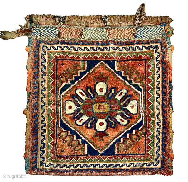 South West Persian ‘chanteh’ small bag size 35cm x 25cm approx. Condition: some wear to its edges, lower right corner with damage.           