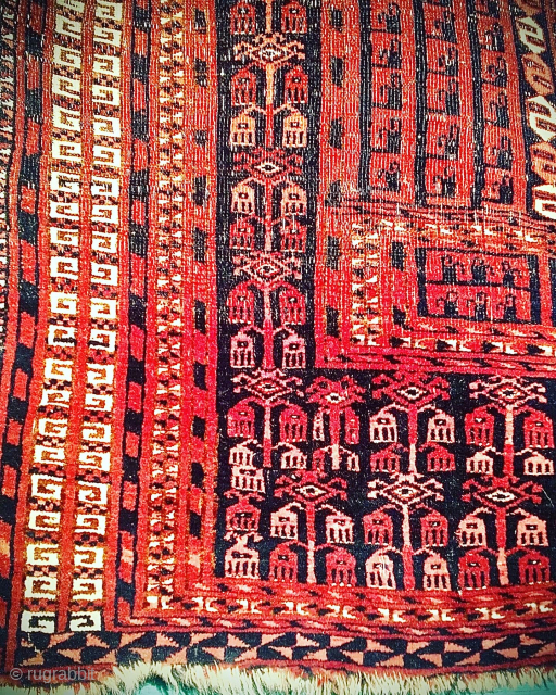 Worn old Saryk Turkmen ‘ensi’ door rug. Size: 155cm x 110cm. Pure wool, no cotton highlights or details. Many holes and sides and ends with losses and damage. Last image shows reverse  ...