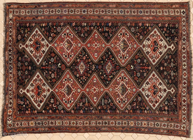 RUG NO : 35 
 
SIZE : 310 x 209 
 
TYPE : Antique 1900 
 
ORIGIN : Iran 
 
DESIGN : Qashqai Shish Buluki 
 
CONTENT : Wool on wool 
  ...