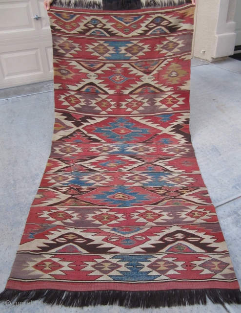 Mid-19th Century Southern Toros Mountain - renown as a Mut (İçel), Anatolian utilitarian kilim.  This is a strikingly "busy" and very unique kilim with goat hair straight fringes.  All natural  ...