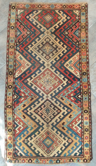 Very intriguing carpet, possibly Gendje.
Professionally washed, some old repair.
cm 175x93
Addional pictures on request                    