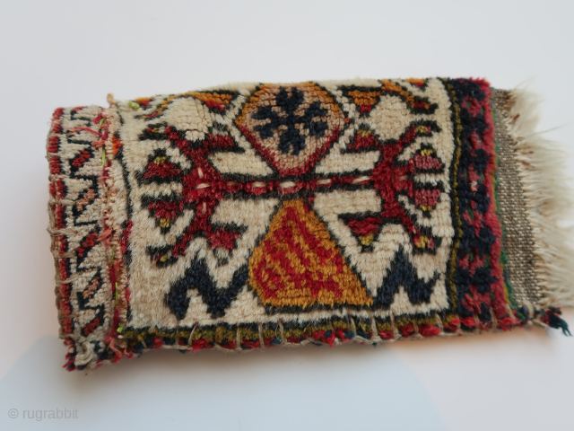 Fragmented 'transcaucasian '( mainly ) bag . Ca ; 18 cm x 32 cm . thick,   long wool and  colors.          