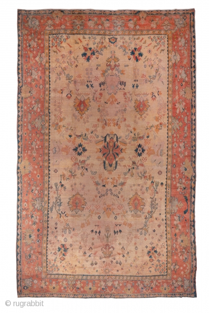 Oushak Carpet

11.7 x 19.0
3.56 x 5.79
 
The straw-ivory field of this western Anatolian town carpet displays a  generously spaced pattern of Harshang palmettes, flowering branches, floating leaves and a central sharply  ...
