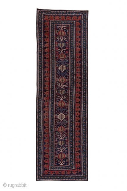 Shirvan 

3.9 x 12.3
1.18 x 3.74

This finely woven east Caucasian long rug displays  a field with a one way palmette  pattern in red ivory green and yellow.  The main  ...