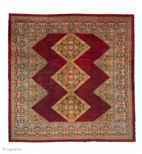 Amritsar Square Carpet

12.2 x 12.4
3.71 x 3.77
The deep wine brown semi-open field shows a pole medallion of three conjoint lozenges with matching side triangle fillers. Giant and lesser botehs  decorate the  ...