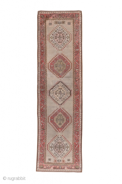 Oushak Runner

2.9 x 9.7
0.88 x 2.95 

This western Anatolian workshop runner has a Caucasian Shirvan design of  five stepped hexagonal disjoint medallions detailed  in ivory, beige, red and dark brown  ...