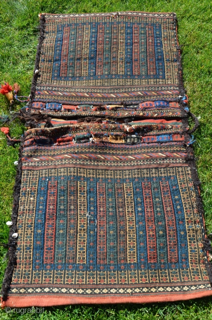 Afshar flatwoven khorjin, 53” X 26”. Early 20thC. Wool. Rare design and beautiful colors. Striped bridge, otherwise plainwoven madder red back. Excellent condition.          