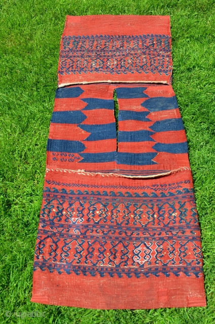 Rare antique complete Yüncü kilim (farda) heybe. Late 19th c. Wool. Saturated patinated natural dyes. Very good condition. Published in the bible of West Anatolian heybes by Bieber, Pinkwart and Steiner "Heybe".  ...