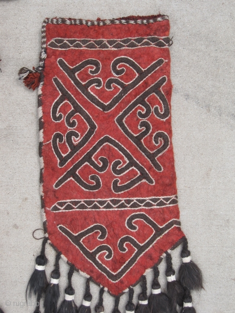 Excellent PAIR of Central Asian wool felt Okbash. Original lining, complete animal hair tassels, super condition! Size 12"x25" (44" w/ tassels).            