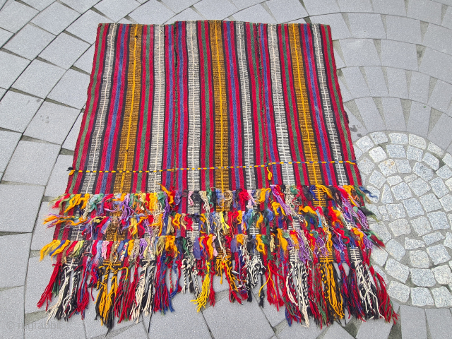 Beautiful nomadic horse blanket from Southeast Anatolia (area between Adana, Urfa and Gaziantep) with interesting metal threads, mohair braids and fabric decorations. Woven in three panels using the Cicim technique. Nice tribal  ...