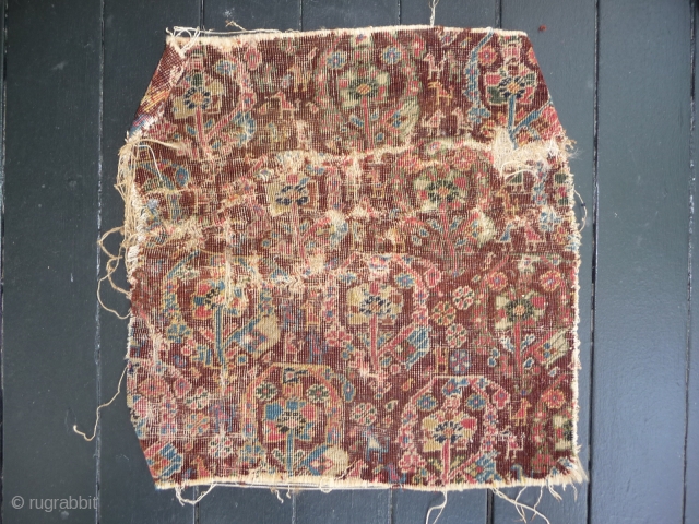 South Persian fragment possibly Qash Qai with silk weft. Worn pile, but still has lovely eggplant, green and yellow colors. Measuring 16" x 15".         