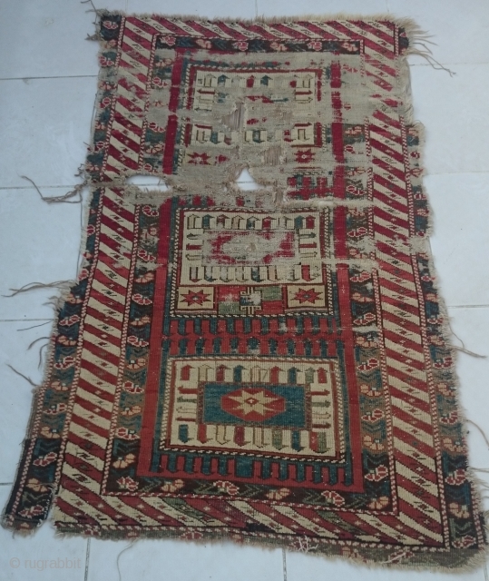 Caucasian Rug in fragmentary condition. Size: 73x129cm.                          