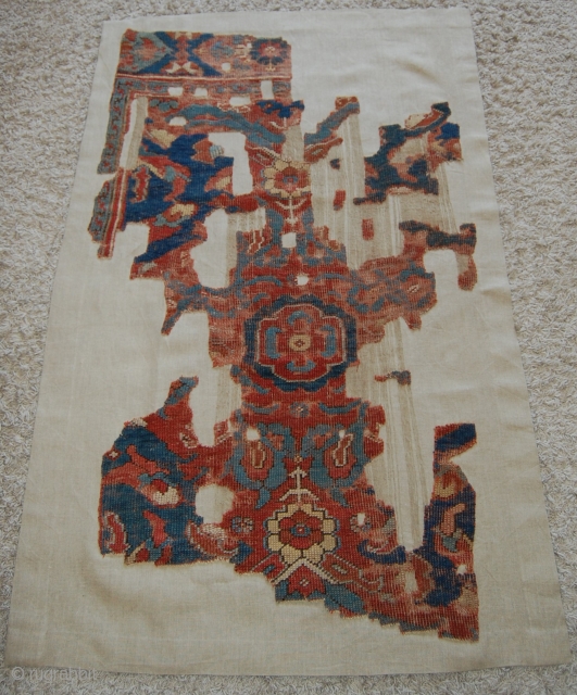 West Anatolian Oushak Rug Fragment – Smyrna Rug. Mounted. Size of support (linen): 116x182cm, fragment size: about 106x172cm.               