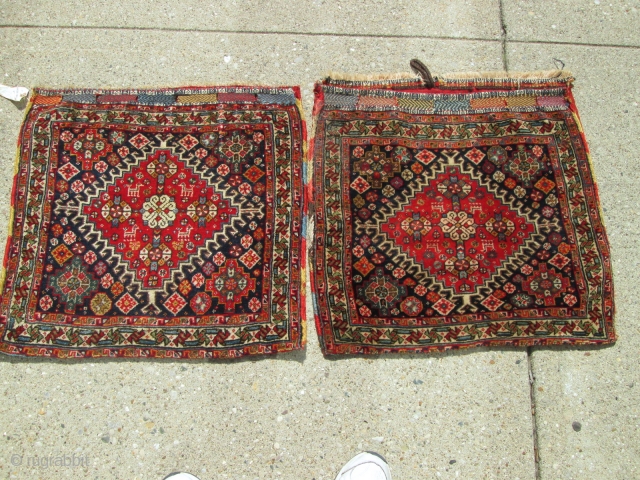 Pair Of Antique Persian  Bag Face Qushgai rugs.

size 24''x24'' each.condition excellent. beautiful top quality silky wool.collective .               