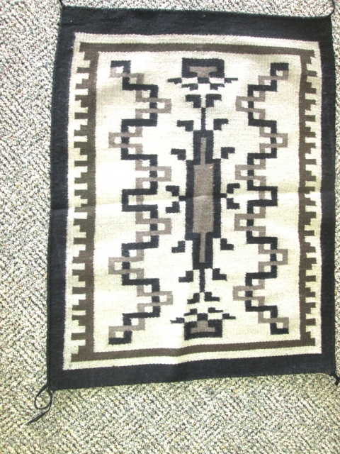 Small Antique Navajo Rug.

size 21''x26''.condition excellent .good weave.                         