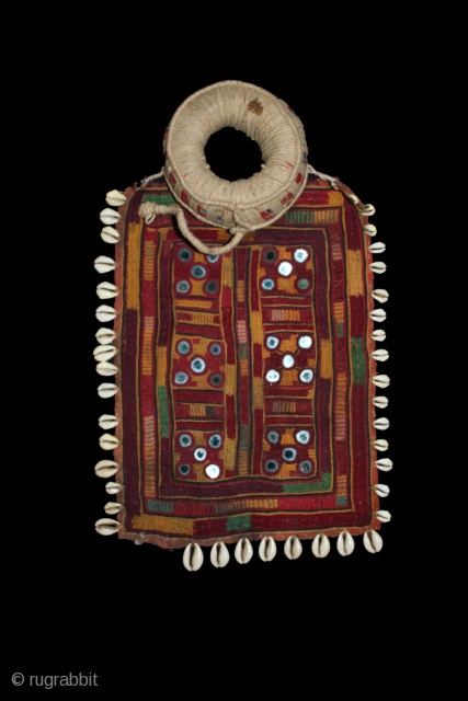 Banjara Gala,Gaadi and Pulia From Karnataka, Telangana,India.C.1910.The pulia has an outside cowrie border,internal lines of cowries and each square element has a mirror work.Its size is 21cm X 30cm.(DSL02250).    