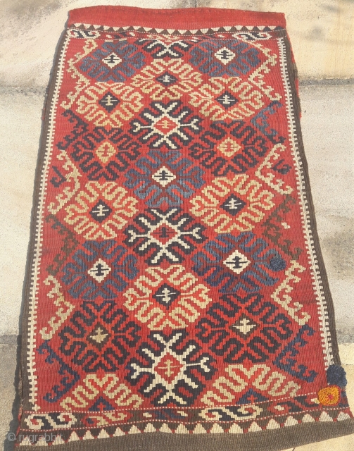 Antique S.E.Anatolian kelim grain bag.Good saturated colours, crisp design
Great colours, could do with a clean.
Old village repairs visible
21in by 40in             