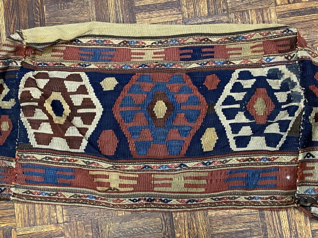 Shahseven kilim cargo bag, 2’10” x 1’10” x 1’9”/ 86 x 56 x 53 cm.

Decorated on four sides with hexagons inhabited by hooked diamonds. On the bottom with red

and yellow stripes.  