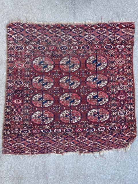 Antique Tekke sitting rug. Nice colors, no fading, fine weave. 

3'3" x 3'3"

Missing the selvedge on one side.               