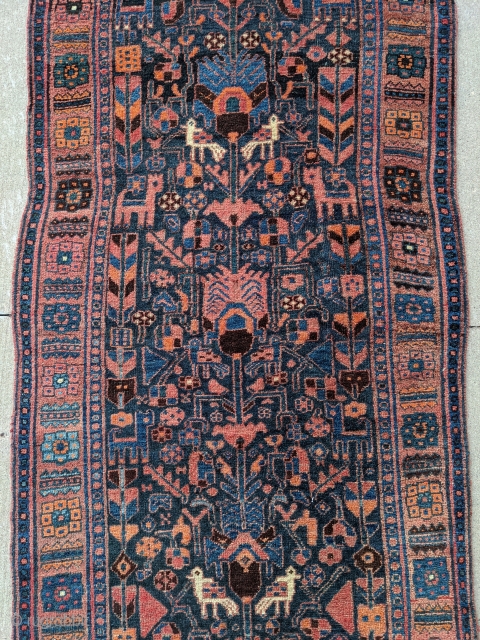 Antique Kurdish runner with gorgeous colors and full pile. 3ft6in x 15ft1in or 106x460cm. Wool on wool foundation. There are a lot of animals on this runner.

Let me know if you need  ...