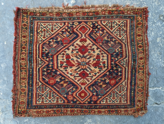 19th century Khamseh Basseri bag with original back. It folds like a cloth. Charming piece. 1'9" x 2'3" when folded. Contact me at: steven.malloch@gmail.com or gerrerugs@gmail.com       