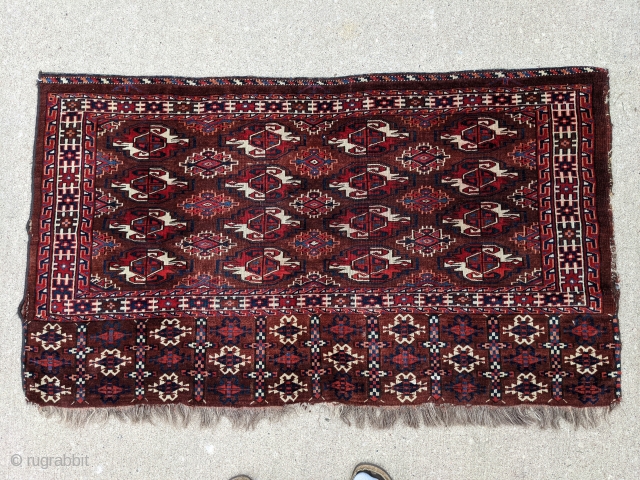 Old Yomut chuwal / chuval. Beautiful unique elem with goat hair warps. Great range of colors. 2'7" x 4'4" or  79 x 132cm.

Cheers.         