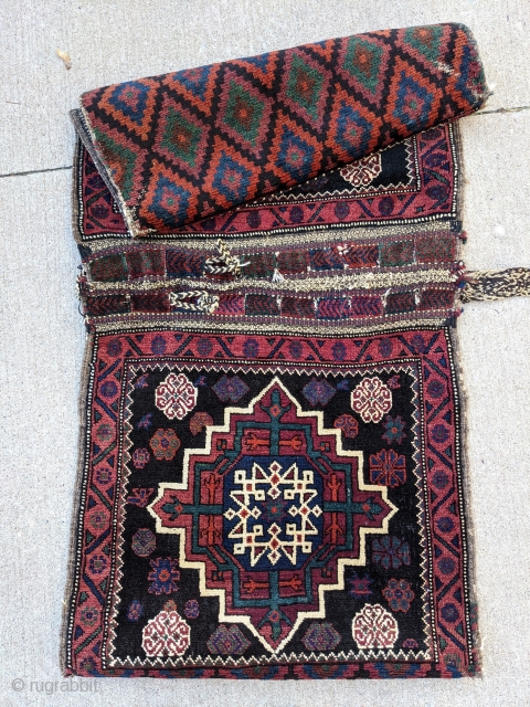 Beautiful old Afshar Kohi full pile khorjin or saddle bag. 2'5" x 8'9" or 74 x 267cm. Beautiful complete piece with goat hair loops and pile on both sides. Gorgeous colors.

Cheers.  