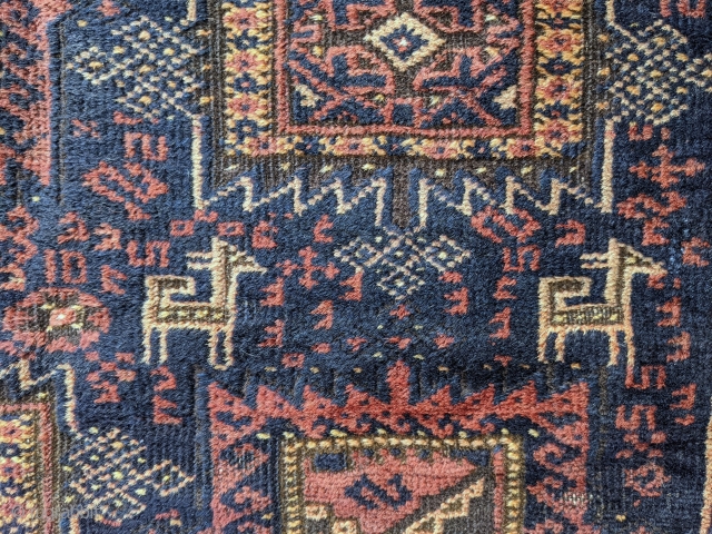 Gorgeous antique Timuri Baluch rug. 3'5" x 6'7". Full pile with wonderful animal motifs and a wide range of colors. Finely knotted. This is possibly late 19th century. The wool really shimmers  ...