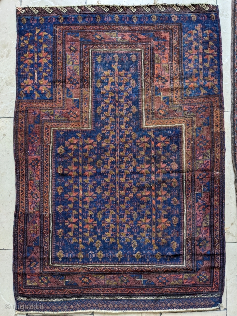 2nd half 19th century Timuri Baluch blue ground prayer rug. Very finely woven piece. There are a few well done repairs in the borders, none in the field.

3'4" x 4'8"   