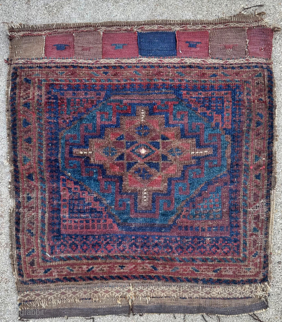 An interesting and colorful Baluch bag face with a few silk knots in the center. 23 x 21" or 59 x 54 cm. Contact me at steven.malloch@gmail.com or gerrerugs@gmail.com for purchase or  ...