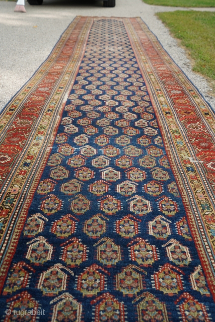 Antique Kurdish runner with boteh pattern. Such great colors and dyes! 3'7" x 16'1". Medium pile with one small wear spot in a middle and few small moth damage spots. No holes,  ...