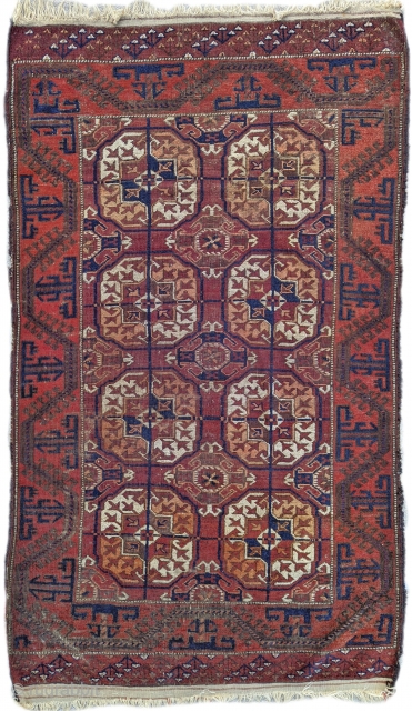 Antique Mahdad Khani Baluch with complete ends and good pile. Well drawn with unusual Tekke style elems. 90 x 158cm or 3'0" x 5'2"1.         