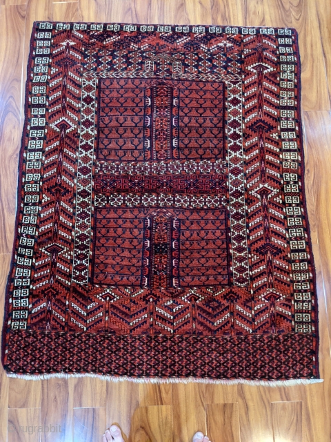 Beautiful antique Tekke ensi. 4'1" x 5'2". Original borders with minor loss to the bottom. Great colors. Some wear to the center quarter panels but mostly full pile.

Cheers.     