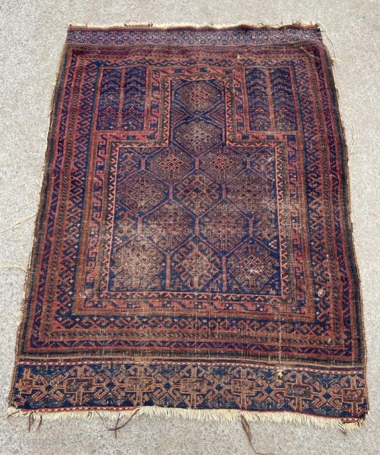 Antique Baluch prayer rug with original end finishes.                         