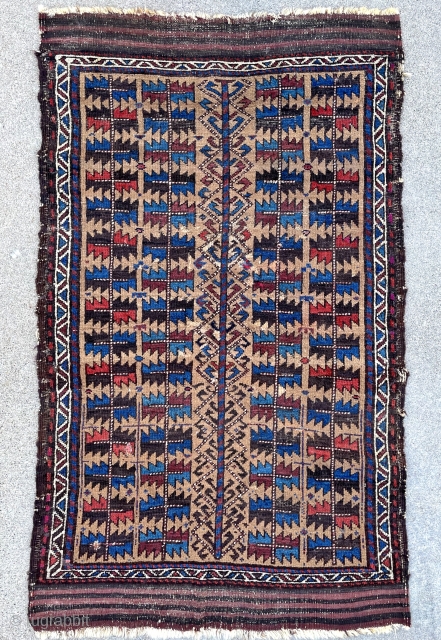 Unique, old and non commercial Baluch rug. 2'9" x 4'8". Some scattered small repairs, overall good pile. Former Jim Dixon collection.            