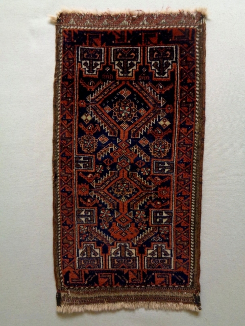 Salar Kahni Baluch
Size: 45x87cm (1.5x2.9ft)
Natural colors, full pile, made in circa 1910                     