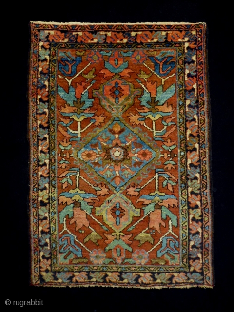 Heriz  Karaja
Size: 82x118cm (2.7x3.9ft)
Natural colors, made in circa 1910, there are a few rows missing at the bottom headend             