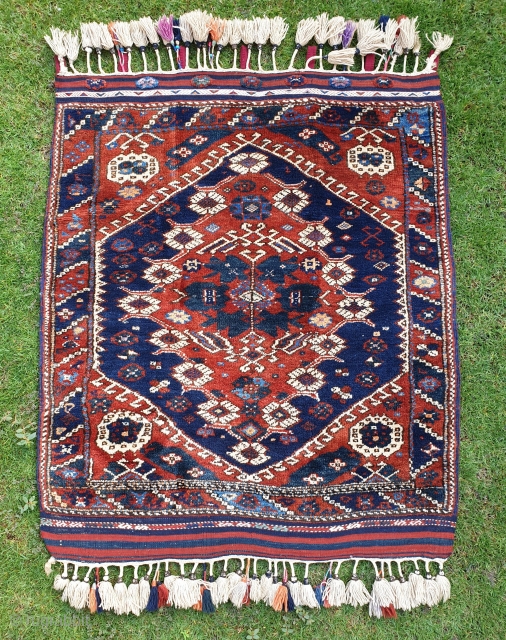 Beautiful tribal Kiz Bergama. In mint condition with very fine wool quality. With full ending kilims and decorative tassels. Size is 100x120 cm.          