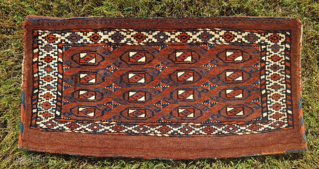 Antique Turkmen Yomud group complete torba with back. In very good condition. Size is: 40x78cm (ca. 15.7x30.7 inches). Great all natural dyes and rare design elements. Upper and lower borders different than  ...