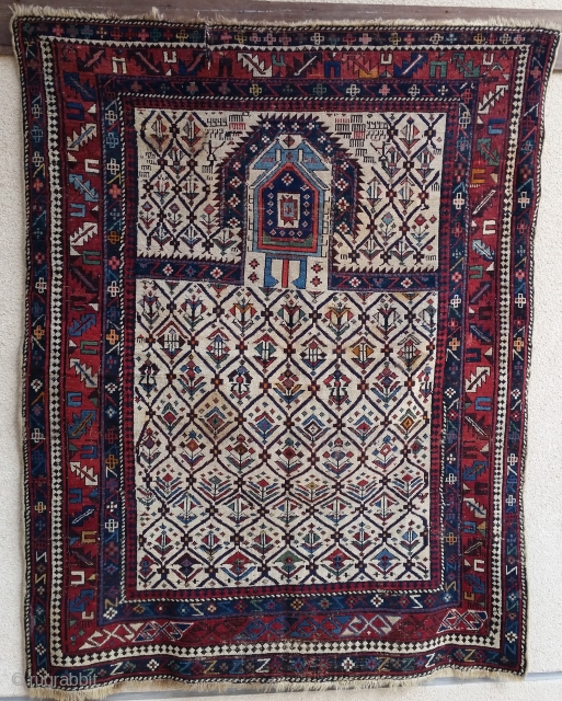 Daghestan prayer rug.. 161x127cm... archaic interesting design.. dated.. Notice how the weaver changed her mind about the main border design!             