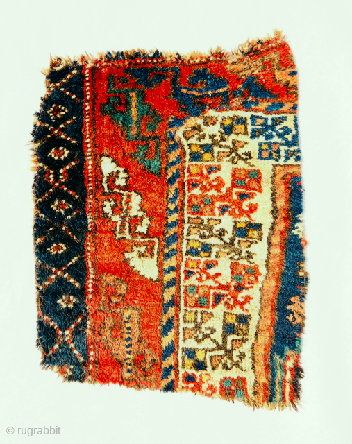 Kurdish rug  fragment mid-19th century, all wool with very attractive colors. Beautiful floral border.size 45x36Cm. Please Contact this email for more information.
hamidparsacarpet@yahoo.com          