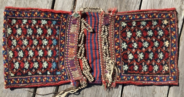 .Small Southwest Persian Khamseh khorjin or saddle bag. Beautiful colors from all natural dyes. Symmetrically knotted. Size is 13" x 31" (34 x 79cm)         