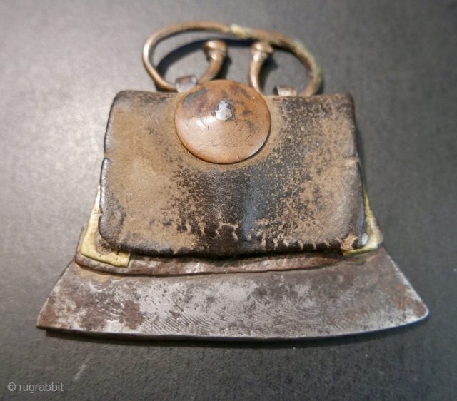 Antique Tibetan Leather Flint Case and Fire Striker.  18th - 19th c.  Beautiful and primitive.   The leather is stiff with age and has a wonderful patina.  And  ...