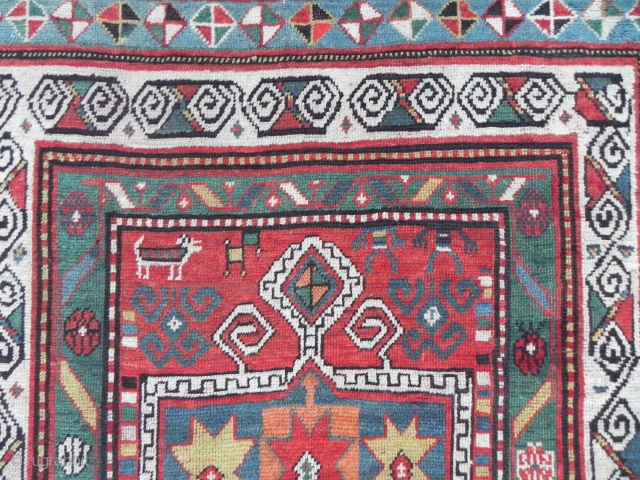 An unusual Caucasian Kazak rug with cool design elements, it is incredibly vital and a nice represantative of a non commercial Caucasian folk art weaving. 3.11x7.9 ft (120x240 cm), 19th Century.  