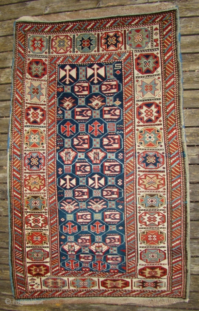 Sweet little Caucasian rug in great shape. All original with braided ends intact.
3x5 feet, 95X153 Cm. (2" wider at lower end and longer on left side)       