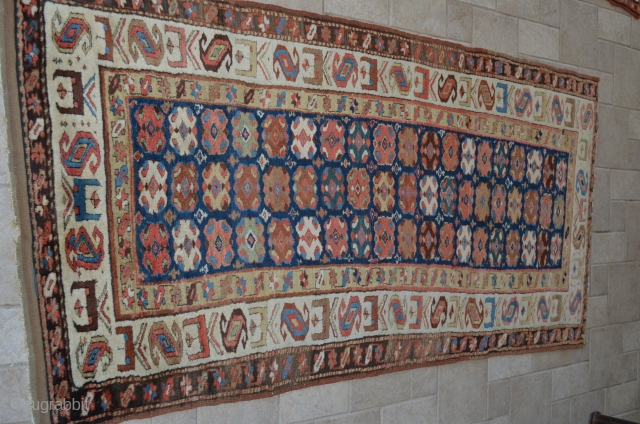 A very nice Kurdish runner, measures 4' x 8'8".  Stunning border, great condition.                   