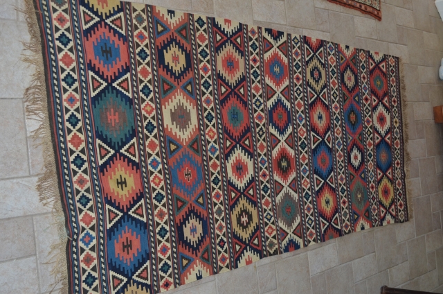 A wonderful Shirvan Kilim in excellent condition.  As you can see from the photographs, this has been taped for hanging.  Measures 9'7" x 4'4".  A great example.   